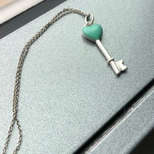 Tiffany & Co Blue Enamel/Silver Key Heart Necklace